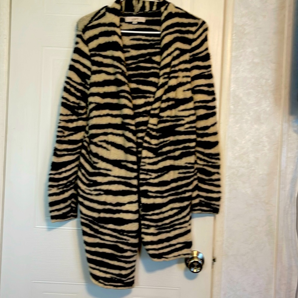 Loft cardigan 100% nylon.  Sixes Medium